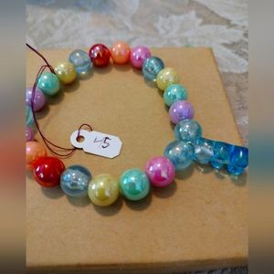Artemis's Gems custom-made beaded bracelet with gummy bear charm, rainbow